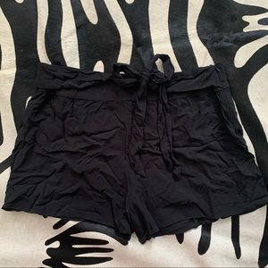 black cloth shorts with tie at waist